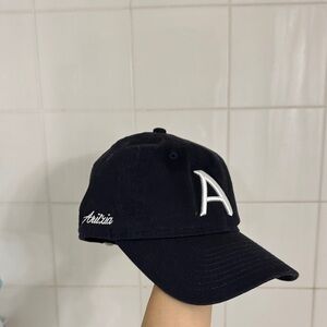 Aritzia Black Baseball Cap with White 'A' Embroidery
